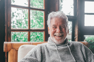 Someone smiling with dentures